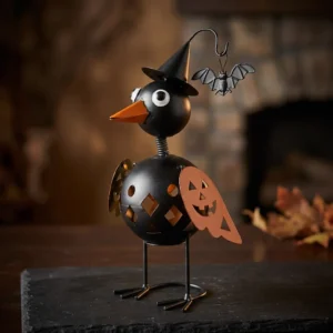 Witchy crow Halloween tabletop decor with pumpkin and bat detail