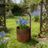 Rustic faucet shaped planter for garden flowers