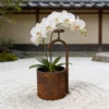 Rustic faucet shaped planter for garden flowers