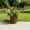 Rustic faucet shaped planter for garden flowers
