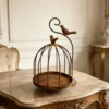 vintage distressed iron birdcage candle holder with bird ornament vintage distressed iron birdcage candle holder with bird ornament