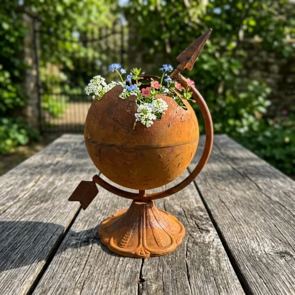 Rustic globe planter with flowers for garden decor