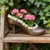 Rustic iron high heel shoe planter for garden and home decor