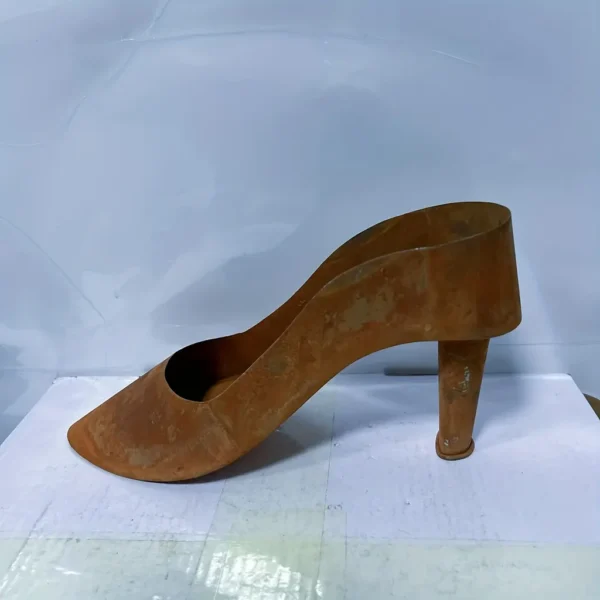 Rustic iron high heel shoe planter for garden and home decor