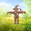 Rustic iron scarecrow garden stake with bird accent for fall decor