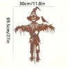 Rustic iron scarecrow garden stake with bird accent for fall decor
